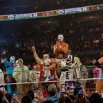 El Grande Americano se consagró como el nuevo Megacampeón de AAA tras derrotar a Dominik Mysterio en la lucha estelar de Triplemanía 34, gracias a que Rey Mysterio actuó como réferi e hizo la cuenta contra su propio hijo.